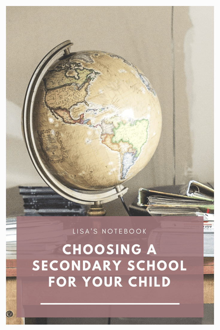 What to Consider when Choosing a Secondary School for Your Child * A globe, some files and books on a school desk
