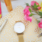 Gratitude Journal Prompts - watch, notepad, pen, flowers, lipstick