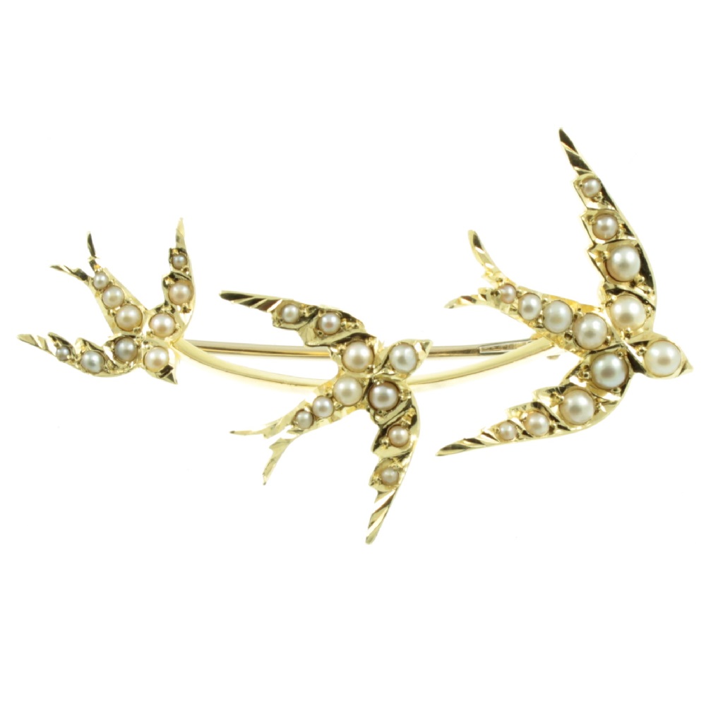Why is Antique Jewellery a Sustainable Style Choice? * Antique jewellery is a sustainable style choice - Edwardian-15ct-gold-swooping-swallows-brooch
