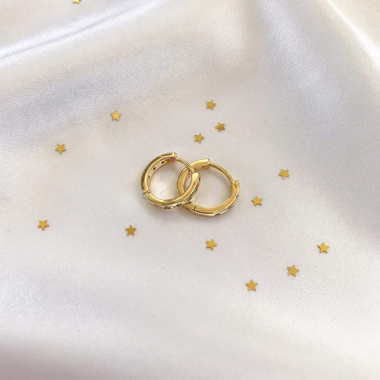 Why gold hoop earrings are a classic accessory worth investing in * gold hoop earrings with zircona inset