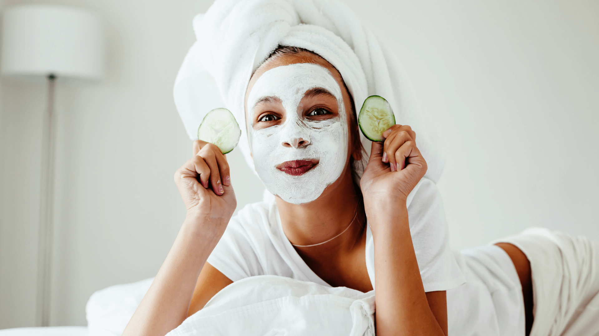 How to Start a Simple Korean Skincare Routine for a Teenager * korean-skincare-routine-for-a-teenager-girl-wearing-mask-holding-cucumber-slices