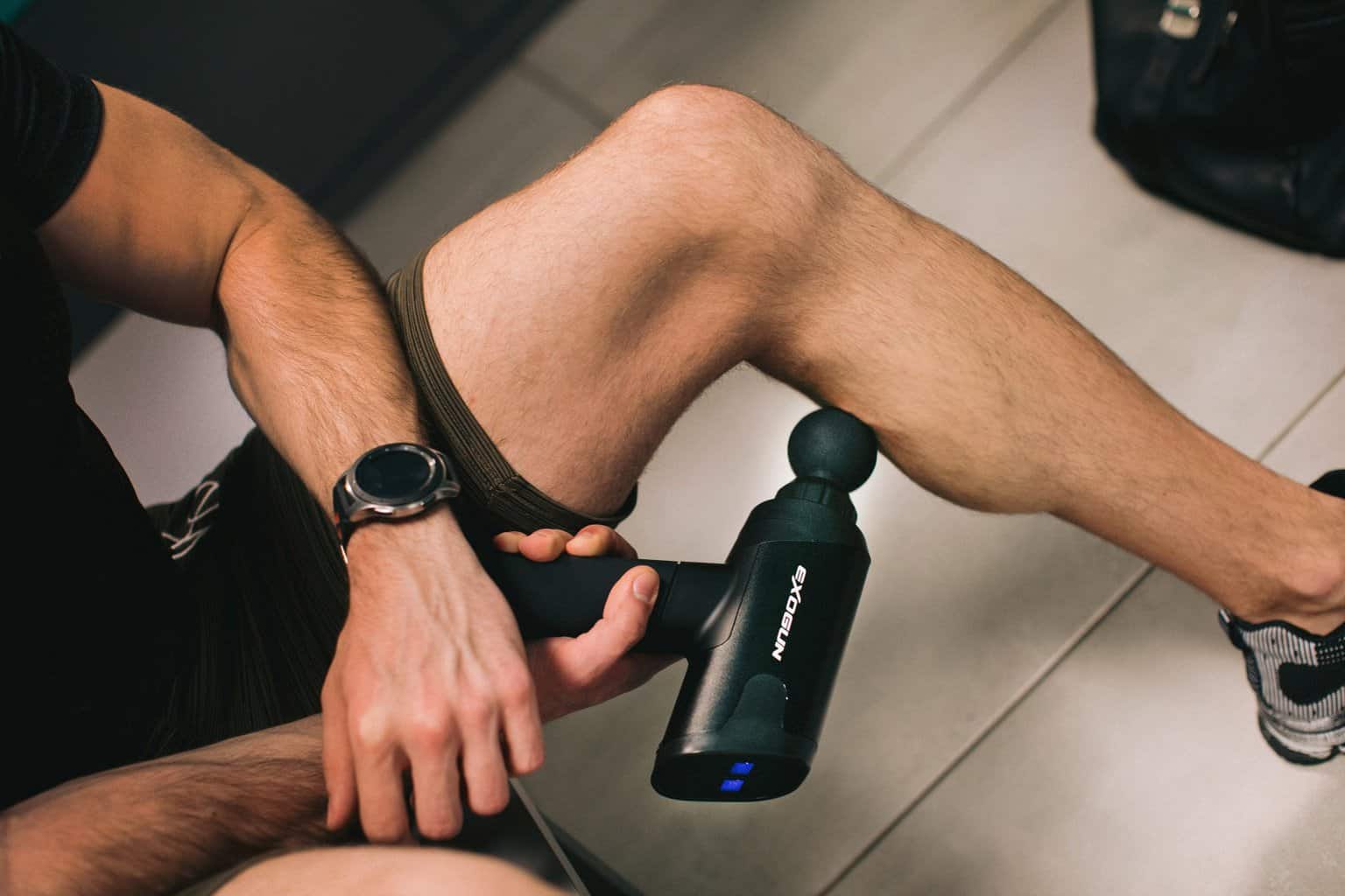 How a Portable Massage Gun Can Quickly Alleviate Your Stress * portable-massage-gun-man