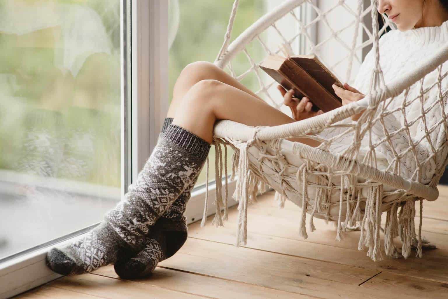 How to Keep Your House Warm in Winter – 9 Top Tips * keep-your-house-warm-in-winter-girl-in-swingseat