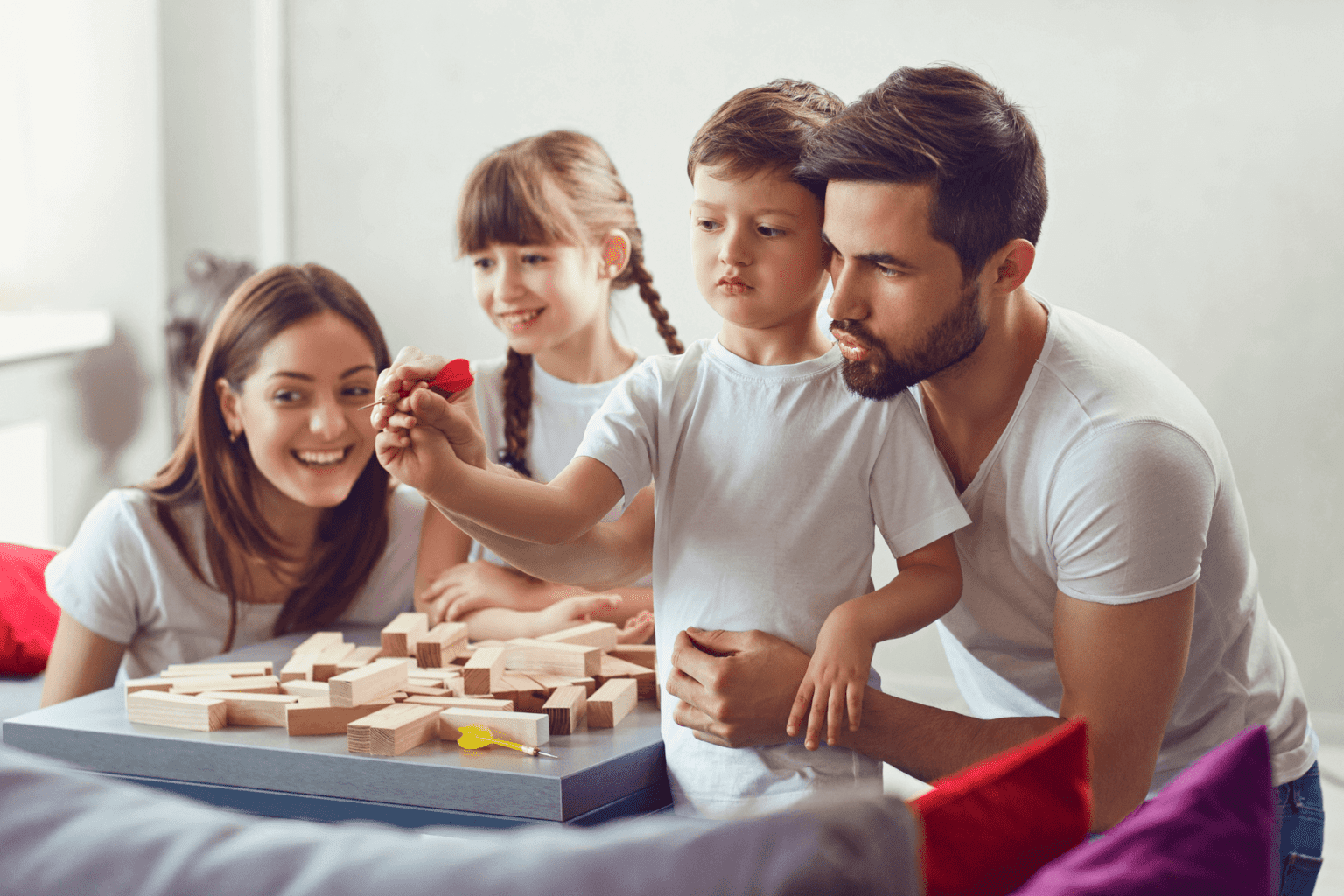 7 Benefits of a Game Room at Home for Stay-At-Home-Moms * game-room-at-home-family-playing