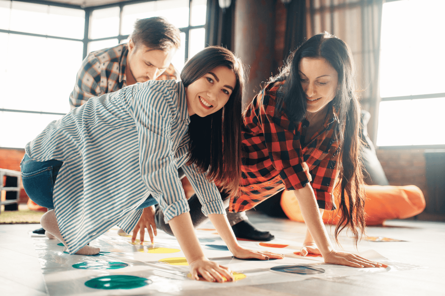 7 Benefits of a Game Room at Home for Stay-At-Home-Moms * game-room-at-home-teenagers-playing-twister