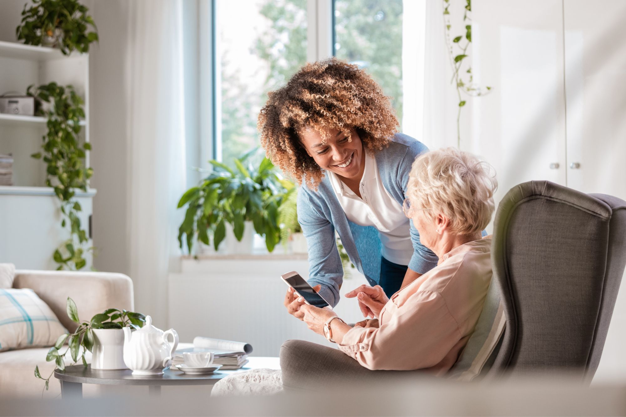 What Is Home Health Care and Who Qualifies For It? * home-health-care-carer-and-seated-lady-pinterest