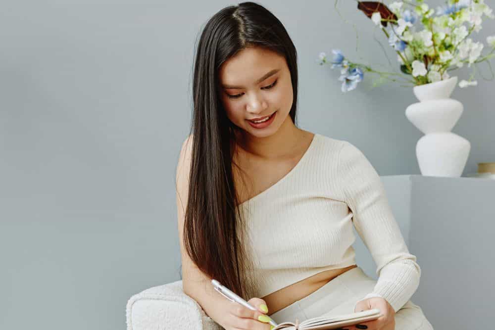 Tips and Tricks to Straighten Your Hair Safely: A Guide to Effortless Style * straighten-your-hair-safely-writing