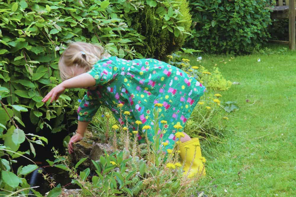 12 Easy and Fun Tips For Gardening With Kids gardening-with-kids-pond-dipping