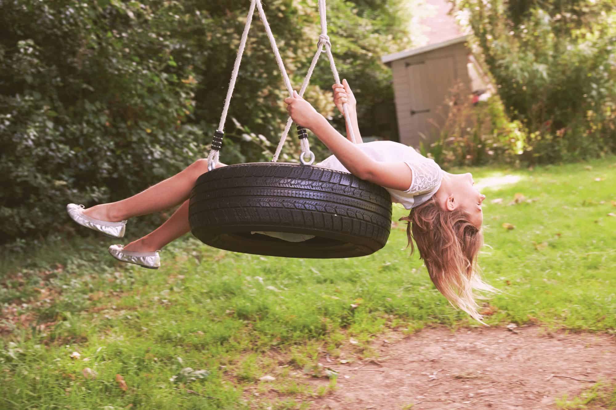How to Create the Perfect Outdoor Play Space on Any Budget * create-the-perfect-outdoor-play-space-tyre-swing