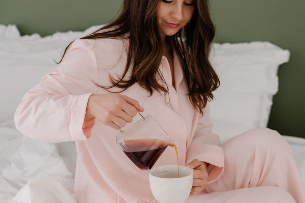 Larger Mattress Protector Guide: Why Bigger Beds Need Better Protection * larger-mattress-protector-tips-pouring-tea
