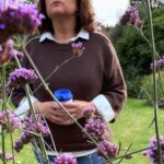 How to wear Poetcore - brown jumper with white shirt underneath showing collar, cuffs, tails