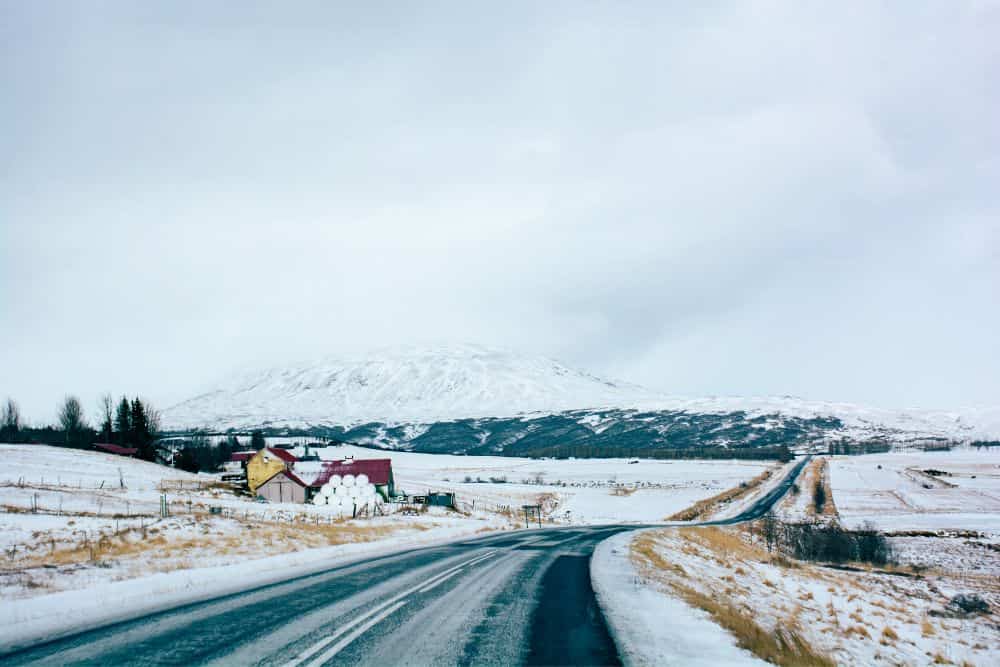 Iceland Road Trip - How to Plan a Scenic Self-Drive Adventure * iceland-road-trip-planning-tips-snowy-road